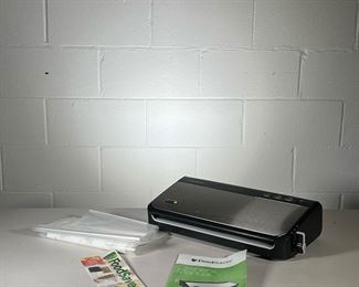 FOOD SAVER VACUUM SEALER | Brand new FoodSaver vacuum sealer with owner's manual & bags. - l. 16 x w. 8.5 x h. 4 in