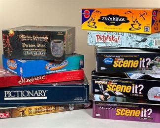 (10PC) BOARD GAMES | Includes: 3 versions of Scene it? (Friends, Movie 2nd Edition, and Disney 2nd Edition); Pirates of the Caribbean Monopoly (Trilogy Edition), Scrabble, Pictionary, Balderdash, ThinkBlot Game, Pirates Dice, and Pictureka.
