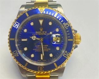 Rolex Men’s Watch 18K Gold & Stainless Submariner. Working.
Oyster Perpetual. 39mm Bezel. Guaranteed 100% Authentic!