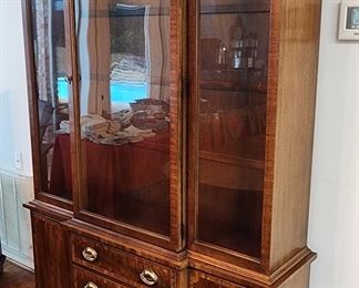China cabinet w/three glass shelves on top and lots of storage underneath. ONE PIECE, so please bring help to move this item.