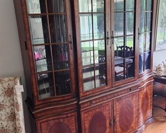 Stunning two piece China cabinet. Three levels of brightness... touch on/off on hinge.
