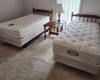 Twin bedroom set w/mattresses box springs, two end tables, and dresser w/mirror.