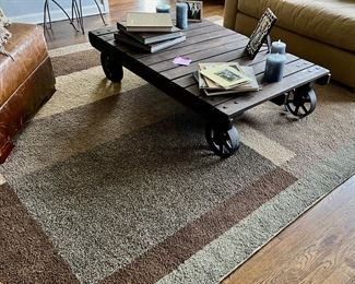 22. Neutral Toned Block Print Area Rug (128" x 92")