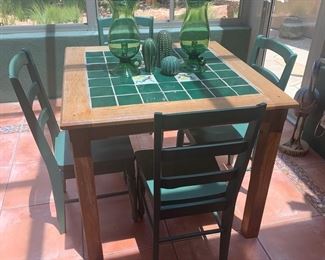 Tile top table and 4 painted chairs