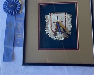 Jackie Sevier (Northern Arapahoe)  1995 leather and quillwork piece; 1st place awards from SWAIA and Gallup Intertribal