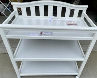 Delta Children's Products White Veneer Changing Table On Casters