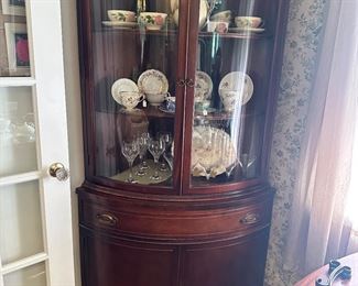 Beautiful Bowed Corner Curio cabinet