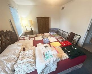 Linens, including king-sized comforters, placemats, tablecloths