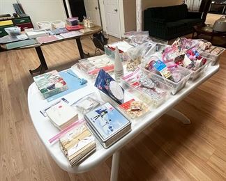 Lots of crafting items, like beads, googly eyes and sequins, plus sewing supplies