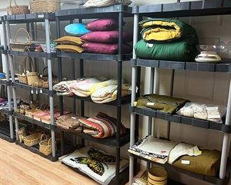 Cushions, blankets and baskets ... plus the shelves