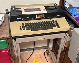 Vintage typewriter and stand