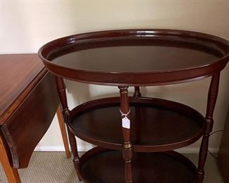 stylish three tiered oval table 
