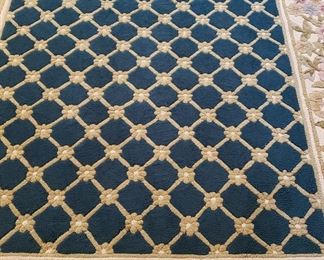 Rug with green/cream, taupe, mauve