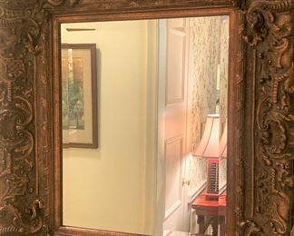 Ornately framed mirror