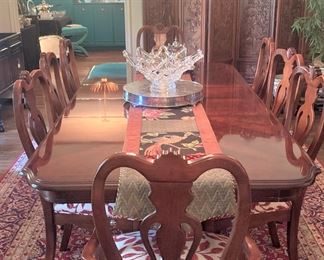 Elegant dining table and 8 chairs