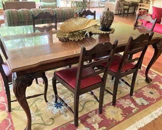 A 3rd dining table; 6 chairs sold separately from the table