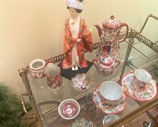 Asian doll and tea set
