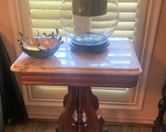 One of several marble top Eastlake antique tables