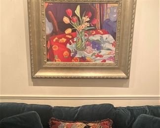 Colorful framed art and pillow