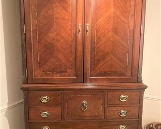 Beautiful TV armoire with lots of storage below