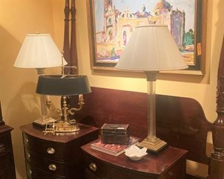 Four-poster rice bed; coordinating 3- drawer nightstands; framed art; matching lamps