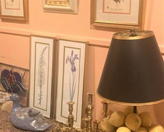 Floral prints; brass candlesticks