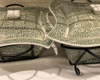 Lidded serving bowls in cradles