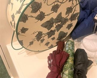 Hat box and umbrellas