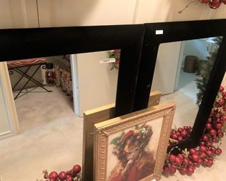 Two black velvet mirrors; Christmas garland