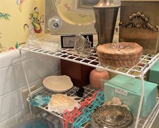 Vanity items including lighted mirror