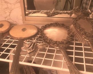 Vanity mirrors and brushes