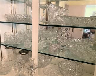 Shelves full of glass, crystal, and cut-glass selections