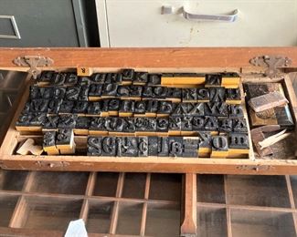 Printer's box and letters