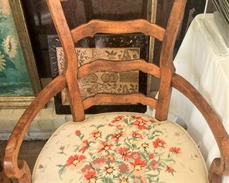 Single chair with needlepoint pillow