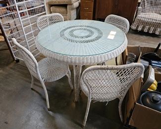 WICKER TABLE AND FOUR CHAIRS