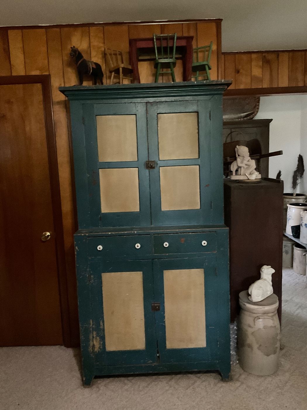 Early 19th century step back cupboard. Inch boards. Original blue paint with combed yellow.  Purchased at auction in Arthur, IL in 1990s.