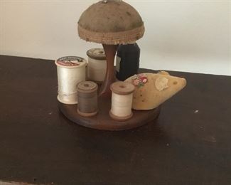 Antique wood thread caddy and pin cushion. 