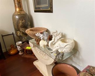 Elephants and a very large vase