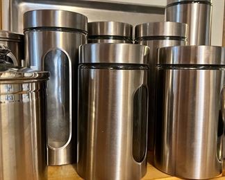 6 Stainless Steel Canisters in Varying Sizes