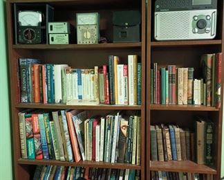 Radio Shack Extreme Range Am/fm Weather Radio, Assortment of Hard Back and Soft Back Books, Weston Multimeter Model 660, Micronta 12 Volt DC Power Supply, Triplett Model 630-PL Voltmeter Meter