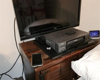 Vizio TV - Phillips VCR Player- Storage Cabinet