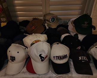 Caps - Lots of Them - Astros  - Texans - Army - Nike  More under Table 