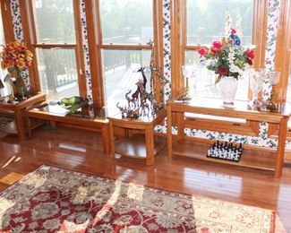 Matching oak with glass insert tables.