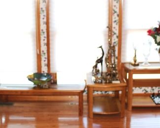 Oak tables with glass inserts.