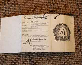 The Serengeti Sunset sculpture by Artisan House is pictured high up on the fireplace in the previous picture.