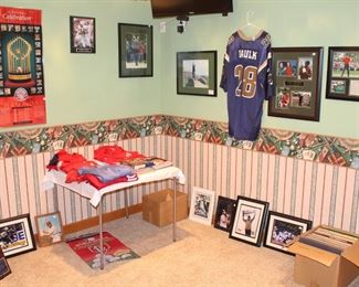 This room is full of sporting clothes and memorabilia.  