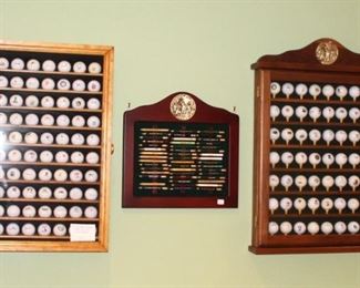 Wall of logo golf balls and logo golf pencil collections.  