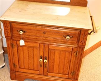 Marble top oak cabinet with towel rails.  Stanley Furniture.  