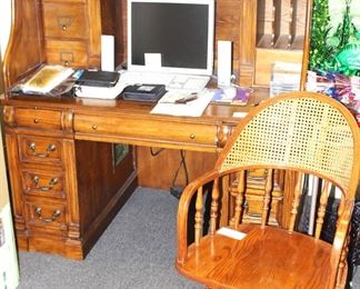Oak roll top desk and chair by Shenandoah Valley Furniture Company.