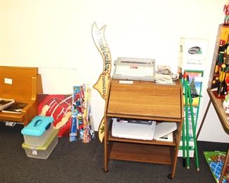 Two electric typewriters, vintage kites, a church pew and more.  